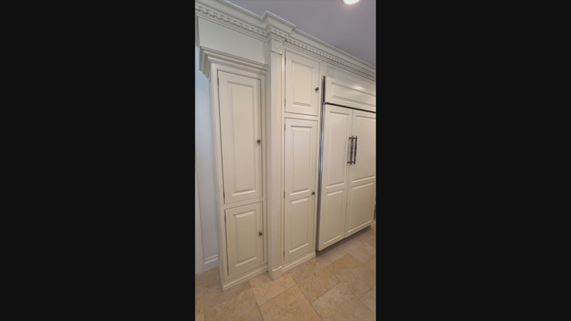 High-end architectural kitchen package in cream with central island