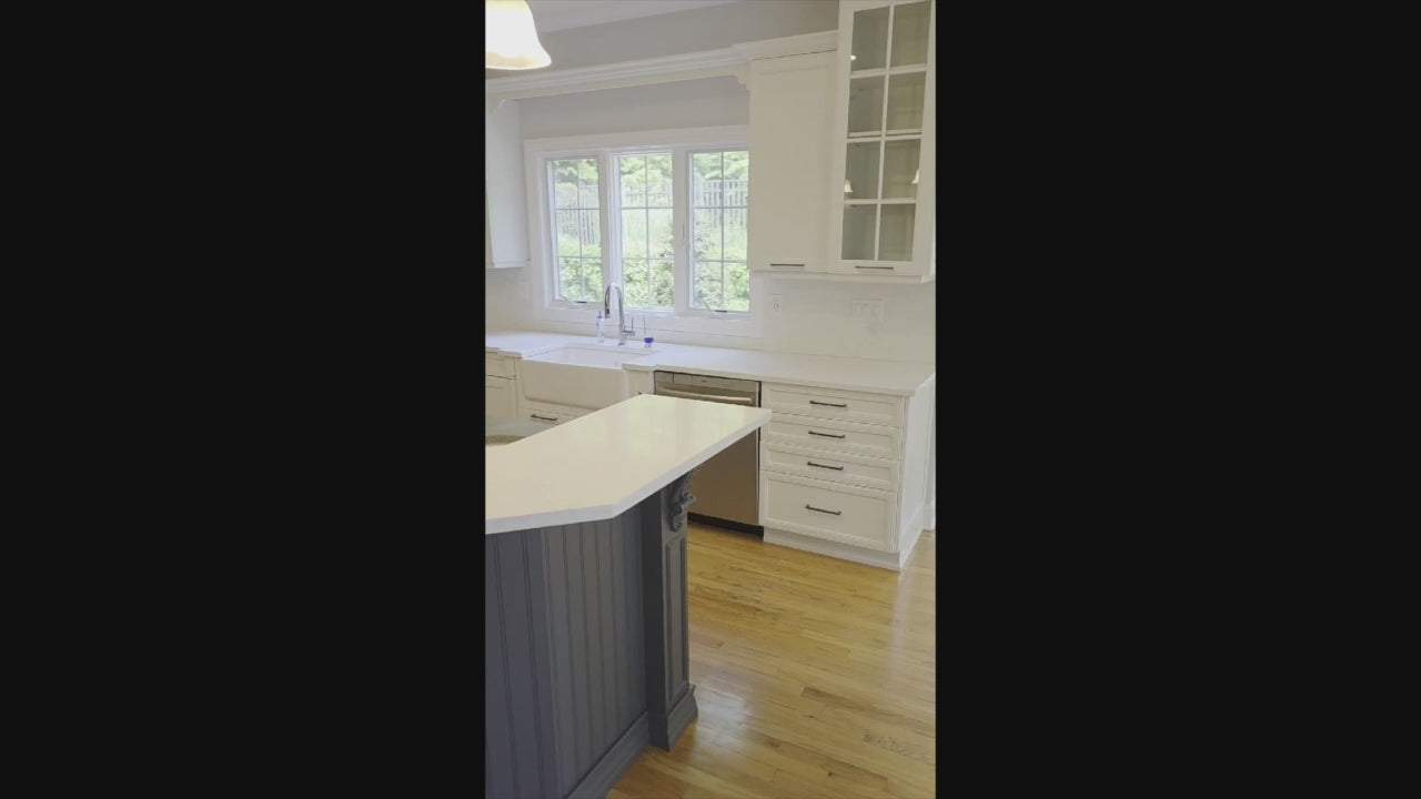 Load video: The Montgomery transitional full kitchen set with white perimeter cabinetry and navy blue island