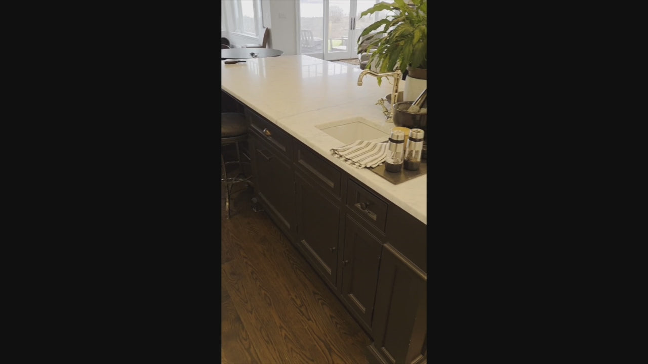 Load video: Professional 48 inch Viking range in a custom transitional white kitchen