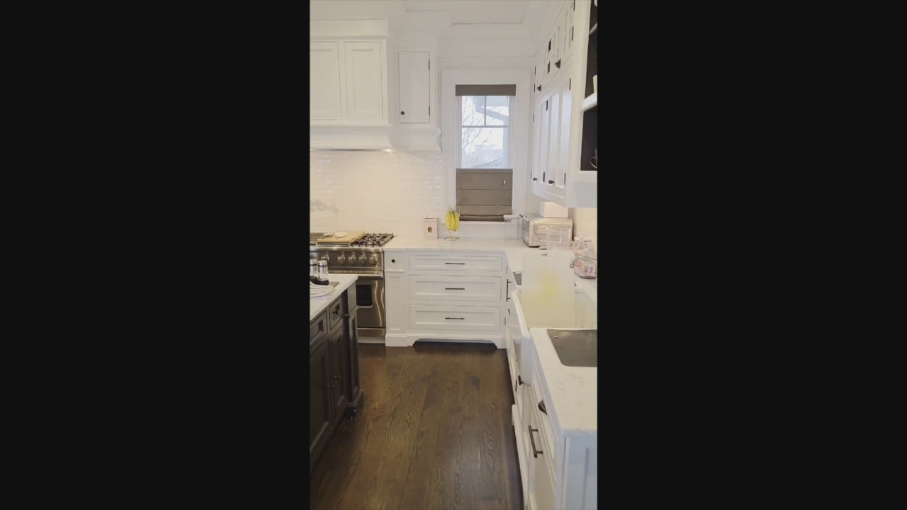 Load video: Luxury pre-owned white kitchen cabinets with Sub-Zero refrigeration