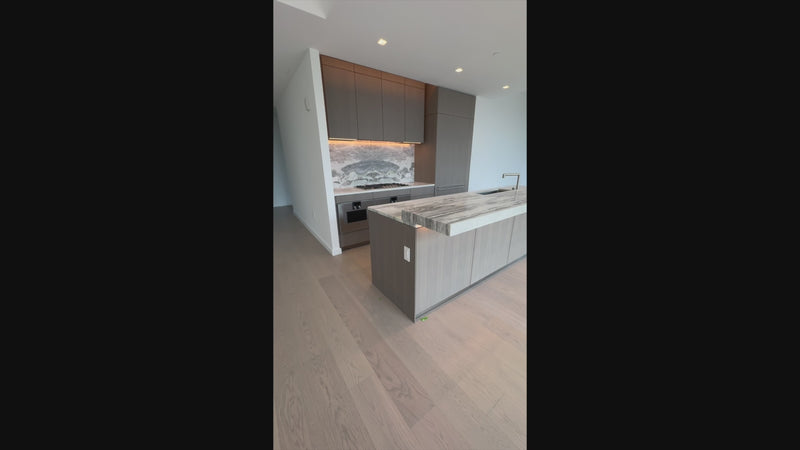 Unused luxury modern kitchen cabinetry with slab doors