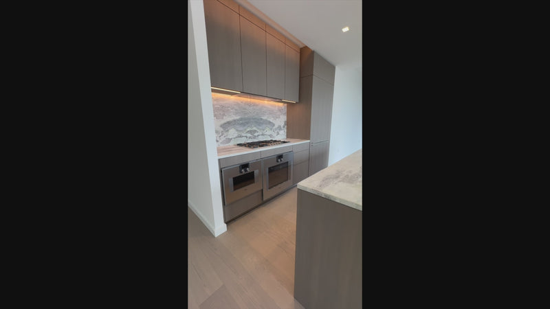 The Tribeca modern kitchen with central island and Gaggenau appliances