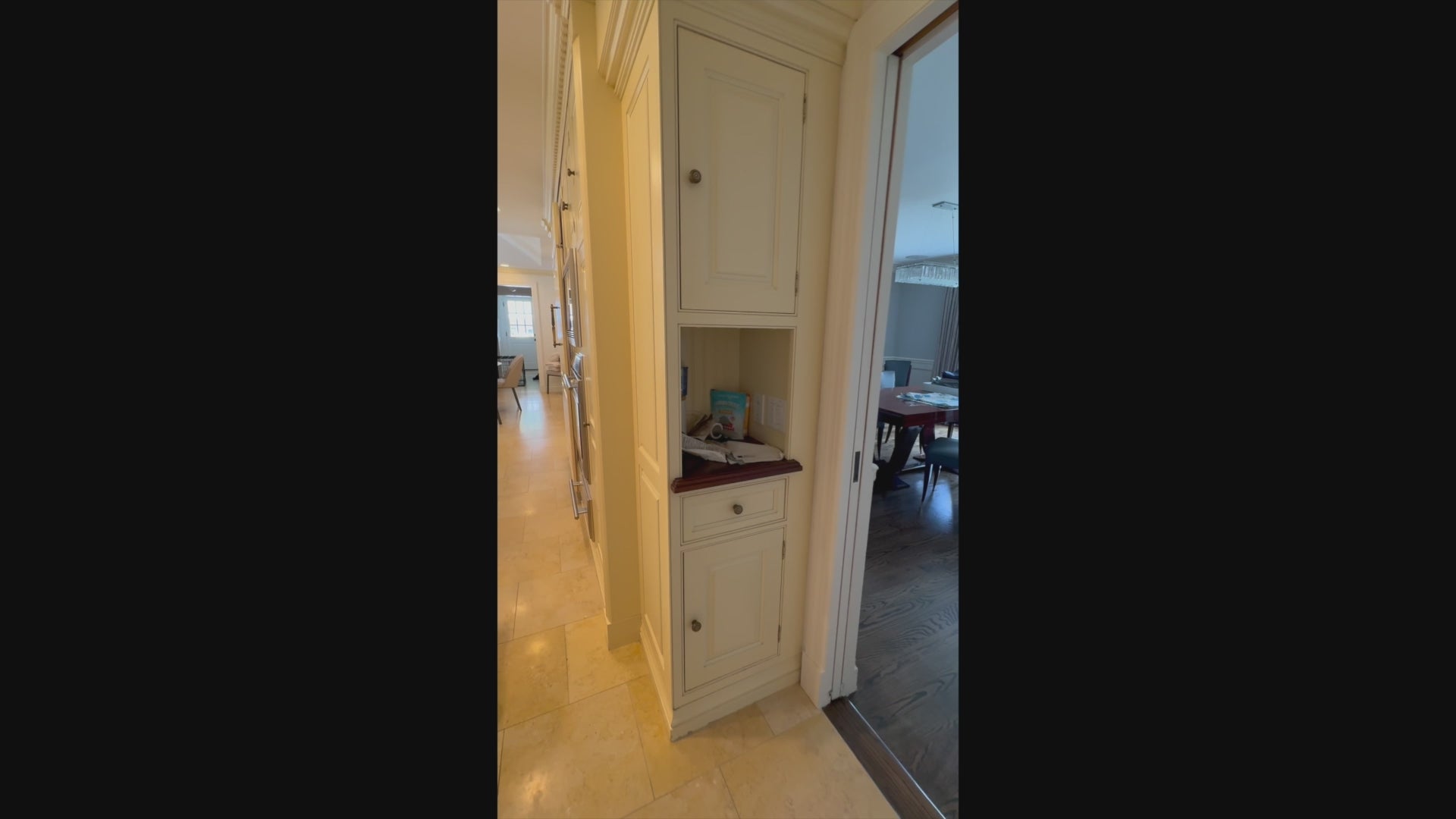 Load video: Luxury European custom cream kitchen cabinetry with classic French detailing