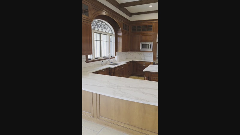 The Highbury traditional wooden kitchen featuring a Viking architectural hearth and large island