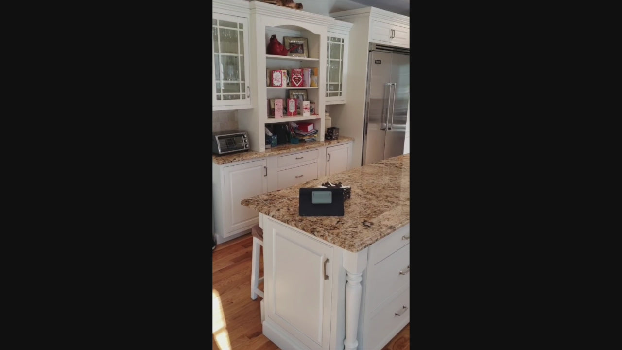 Load video: Traditional Light Cream Kitchen with Island, Granite Countertops and Appliances