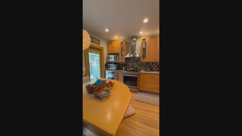 Millennia transitional craftsman shaker kitchen with 36 inch sub zero refrigerator