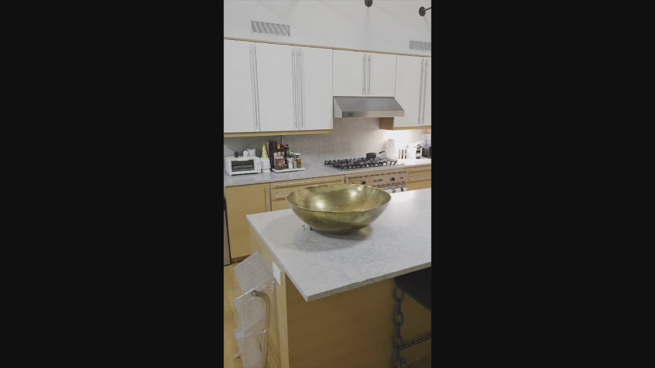 Load video: Luxury kitchen island with Poggenpohl cabinetry and stone countertops