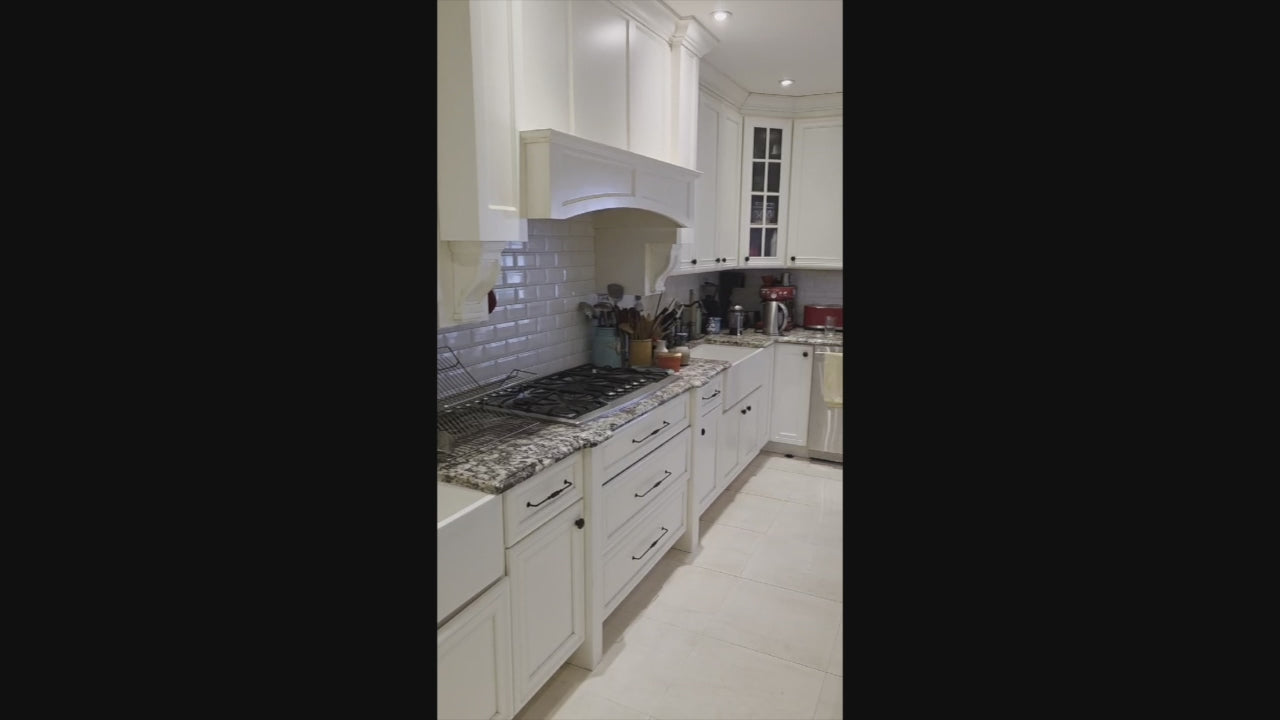 Load video: Candelight Traditional Off White Kitchen with Island and Monogram Appliances