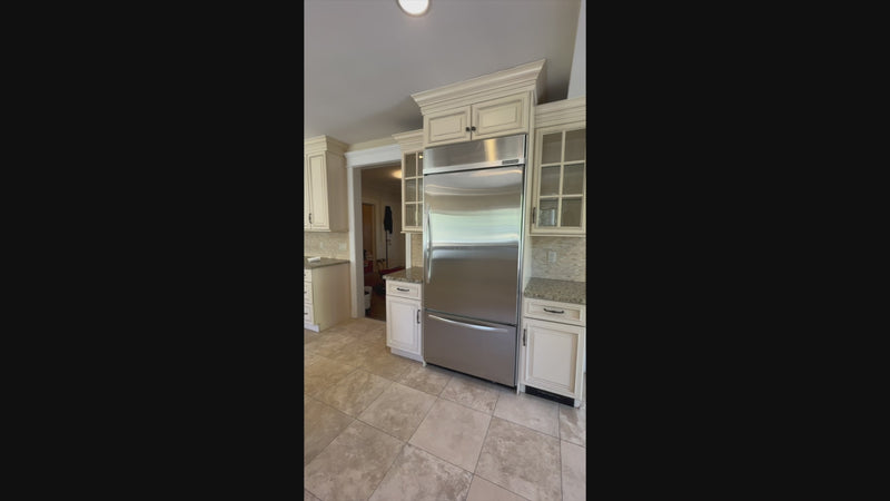 Luxury architectural estate kitchen cabinetry with raised panel doors and millwork