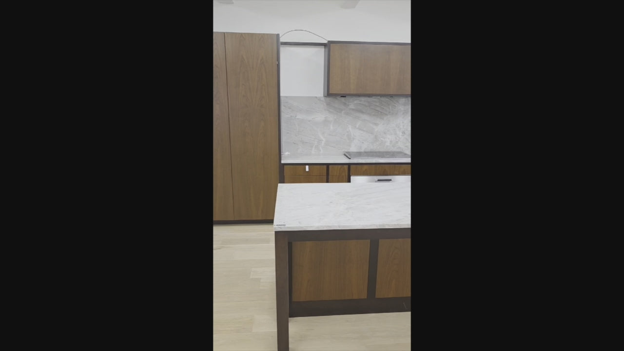Load video: Plato Natural Walnut and Espresso custom modern kitchen