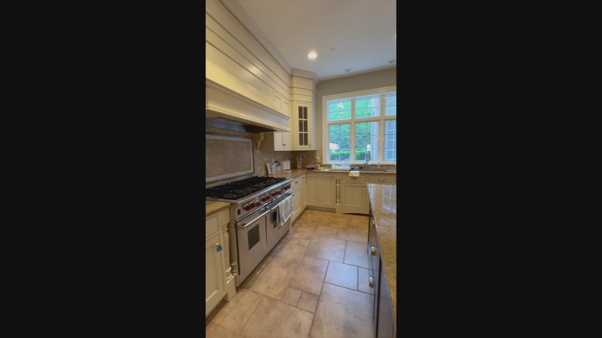 Load video: Omega transitional linen white kitchen with black island and custom cabinetry