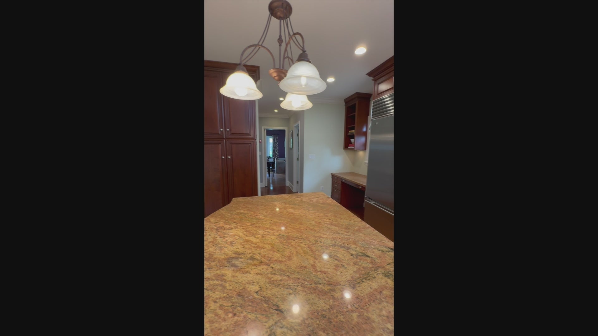 Load video: View of Brookhaven kitchen island and integrated luxury appliance suite