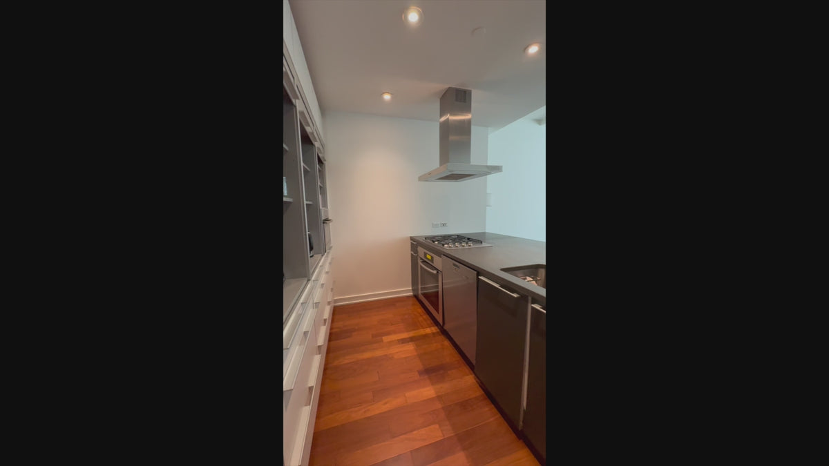 Load video: High-end showroom display complete contemporary kitchen package with professional appliances