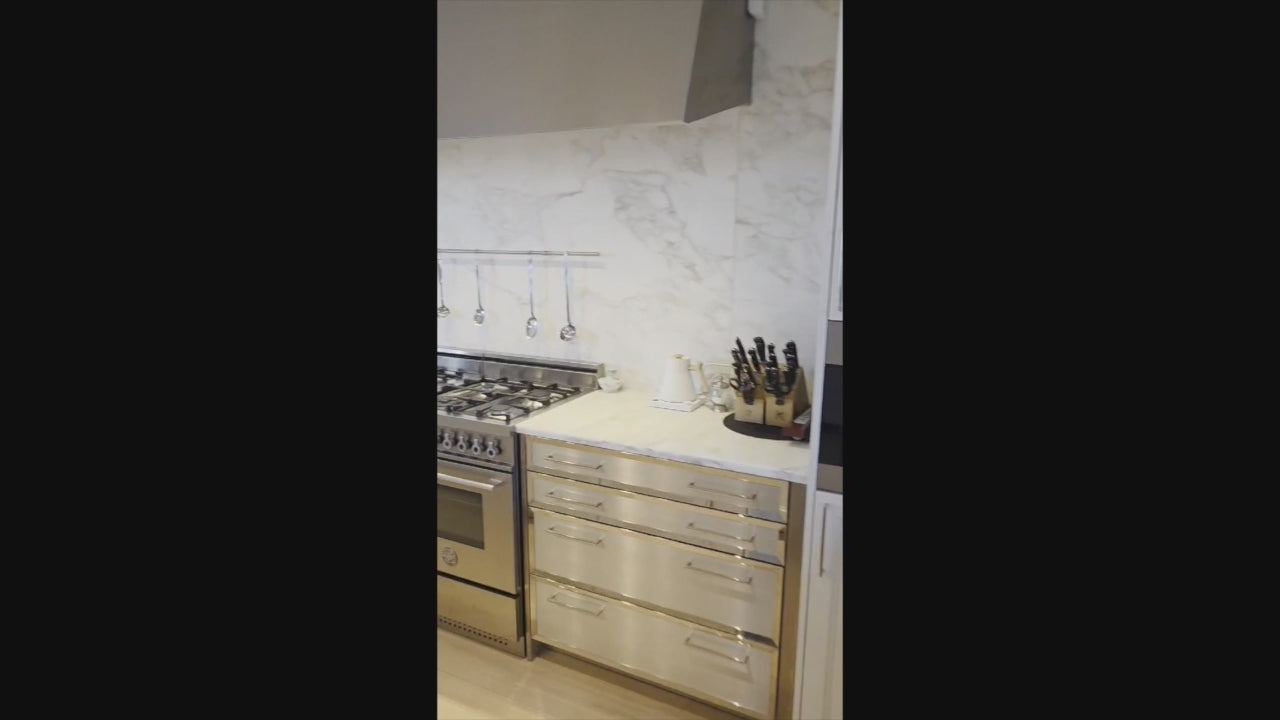 Load video: Pre-owned SieMatic kitchen cabinetry and marble countertops