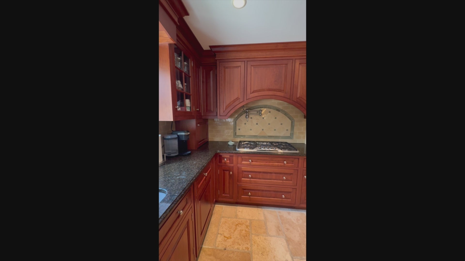 Load video: Traditional custom wood kitchen cabinetry and professional appliance package