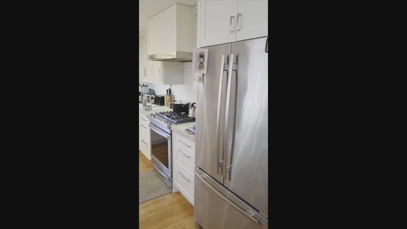 Cuiffo Cabinetry custom white transitional kitchen with island and JennAir range