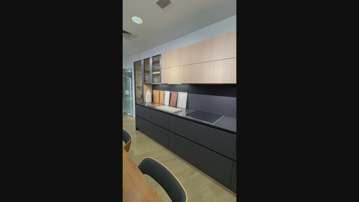 Load video: Hans Krug Modern Grey &amp; Oak Veneer Kitchen Corner with Wolf Appliances
