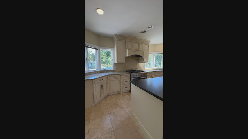 Fabuwood off white traditional custom kitchen suite with center island and appliances