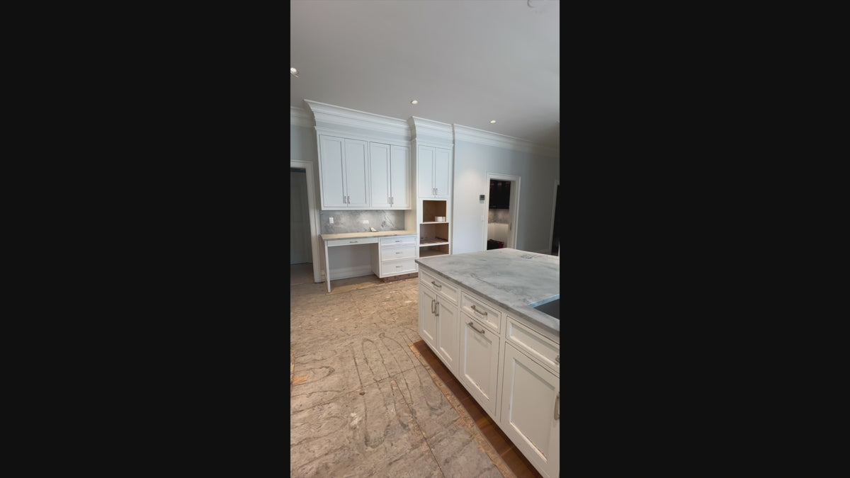 Load video: High-end architectural residential kitchen cabinetry in classic white finish