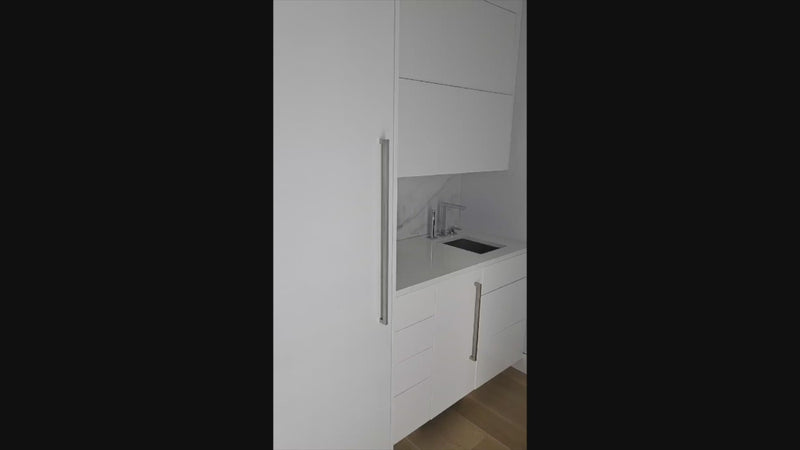 Brubaker Modern White Lacquered Butler's Pantry with Stone Countertops and Ice Maker