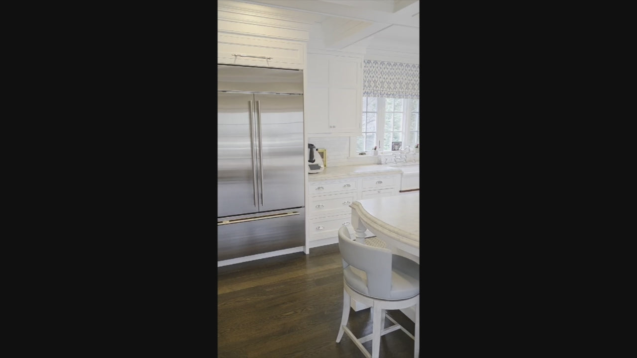 Load video: Premier custom-built white transitional kitchen with large island and full appliance package