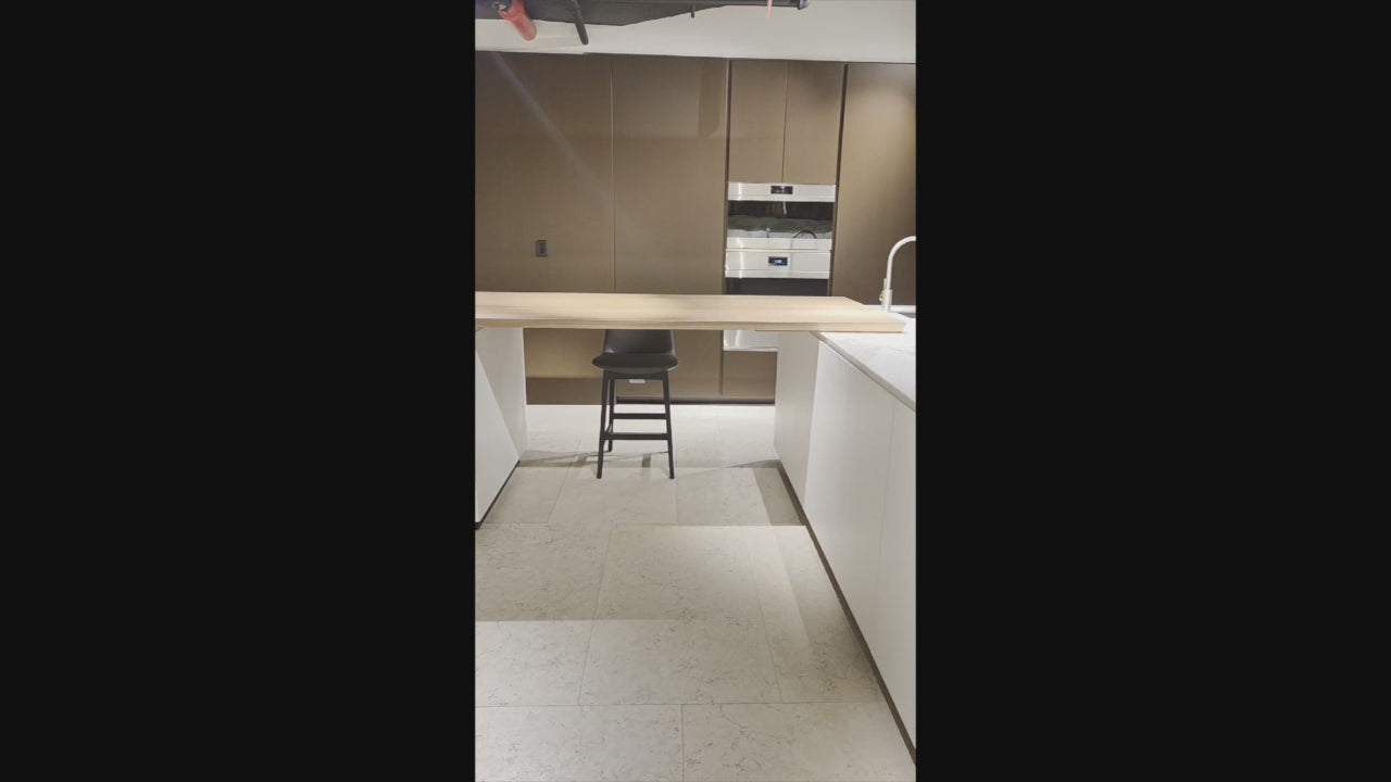 Load video: Poliform Artex Glacier White &amp; Moka Modern Kitchen with Marble Countertops and Sub-Zero &amp; Wolf Appliances